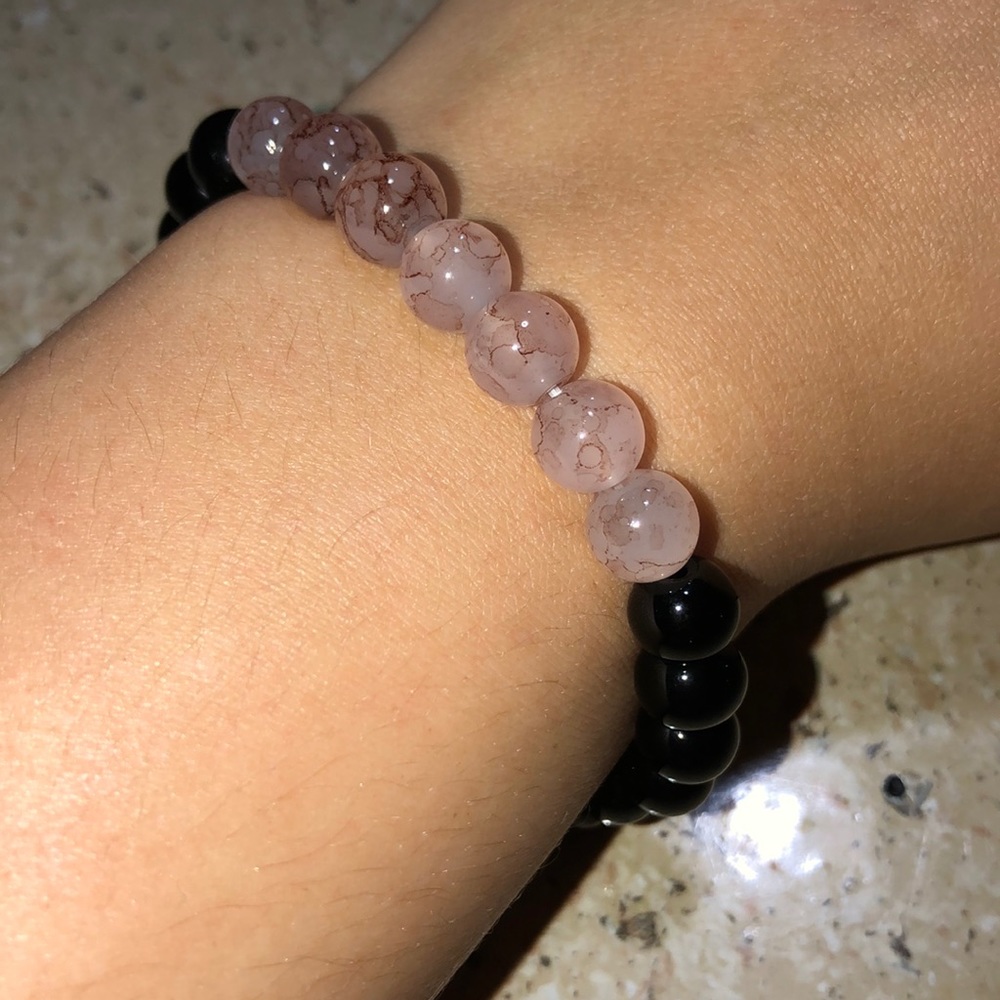 Pink and black bracelet